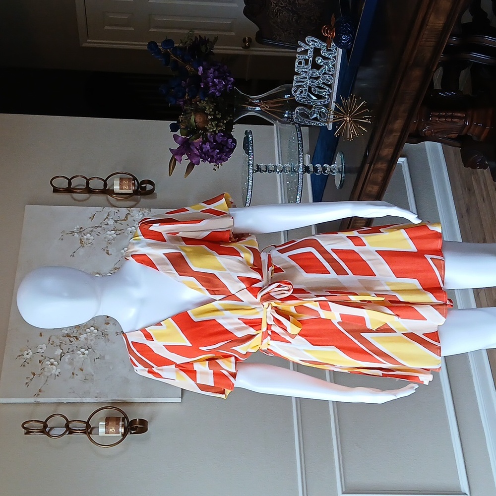 New Vibrant Orange and Yellow Patterned Wrap Mini Rorper. Size L - Picture 16 of 17